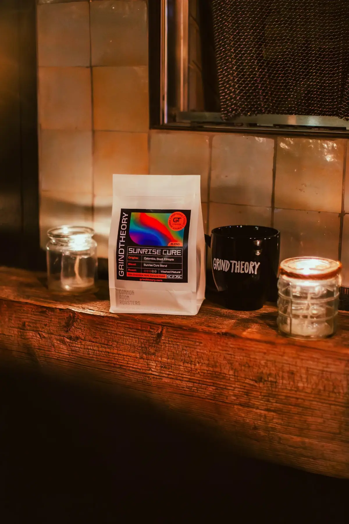 Sunrise Cure coffee bag held up on a Long Beach street at night